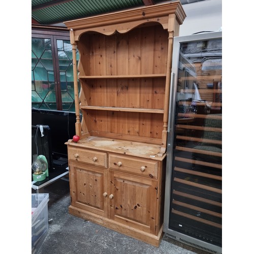 855 - Star Lot : A charming two-part display Welsh dresser with two shelves to top and cupboard storage to... 