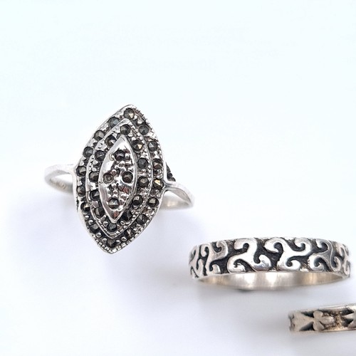 33 - A collection of seven sterling silver rings featuring a 19th century breton ring, ring sizes I x1, H... 