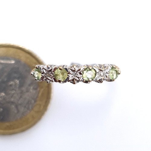 670 - A diamond and lemon quartz 9K gold ring, ring size M, weight 1.81 grams, ring in original box.