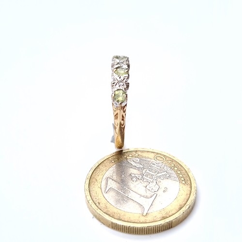 670 - A diamond and lemon quartz 9K gold ring, ring size M, weight 1.81 grams, ring in original box.