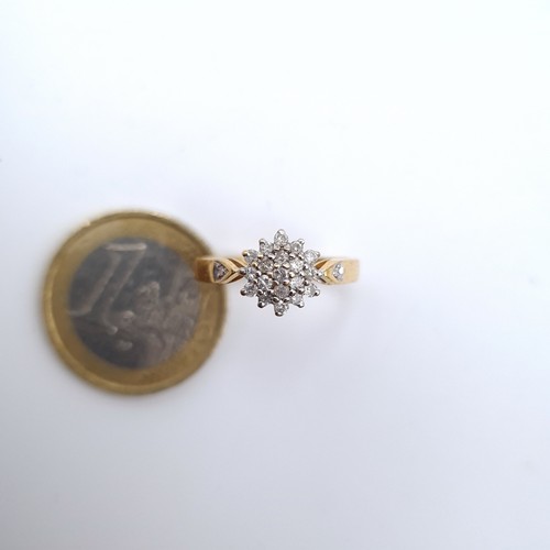 671 - Star Lot : An attractive diamond cluster ring, marked 750, 18ct gold ring size L, weight 3.13 grams.... 