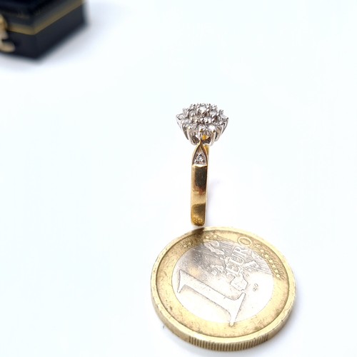 671 - Star Lot : An attractive diamond cluster ring, marked 750, 18ct gold ring size L, weight 3.13 grams.... 