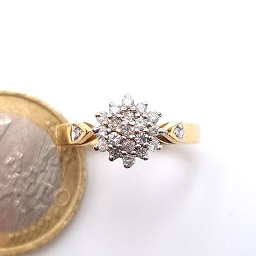 671 - Star Lot : An attractive diamond cluster ring, marked 750, 18ct gold ring size L, weight 3.13 grams.... 