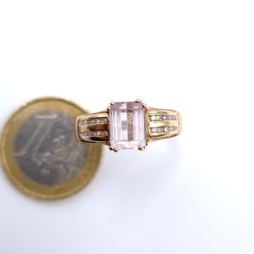 673 - Star Lot : A very attractive pink quartz  ring with 20 diamond channel cut shoulders, size P, weight... 