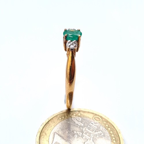 674 - Star Lot : A super pretty emerald and diamond 9K gold ring, size O, weight 1.68 grams.