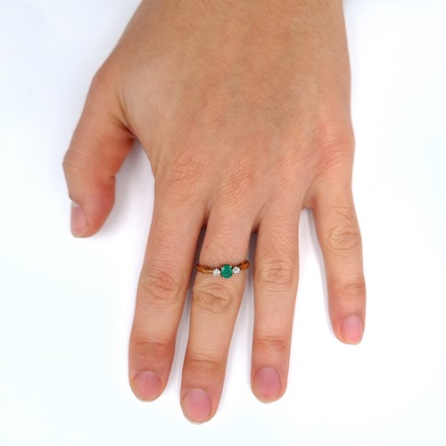 674 - Star Lot : A super pretty emerald and diamond 9K gold ring, size O, weight 1.68 grams.