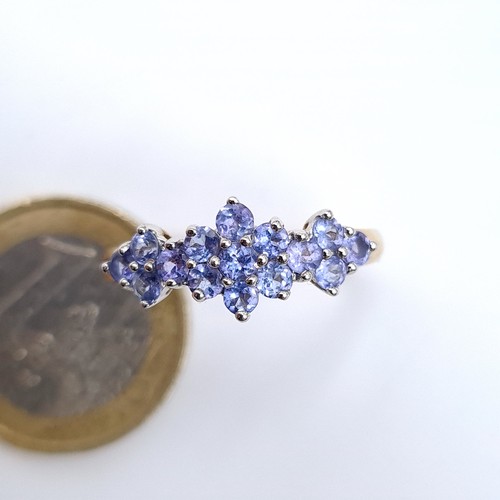 677 - Star Lot : A 9K gold lovely tazanite stone ring, size S, weight 2.13 grams, boxed. Tanzanites are ra... 