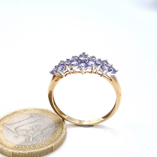 677 - Star Lot : A 9K gold lovely tazanite stone ring, size S, weight 2.13 grams, boxed. Tanzanites are ra... 