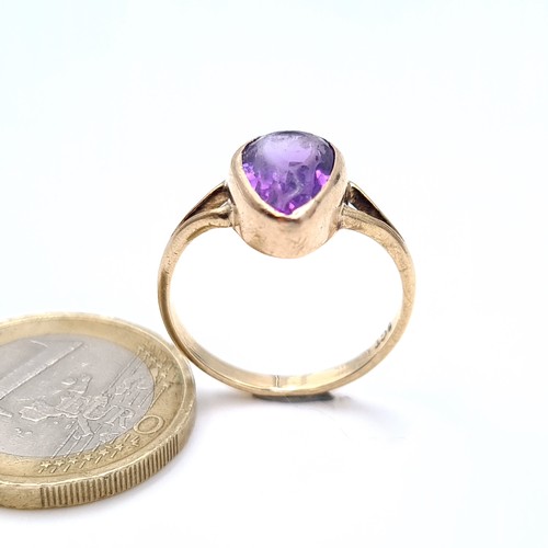 682 - Star Lot : A lovely large amethyst stone ring set in 9K gold, ring size O, weight 2.60 grams, boxed.