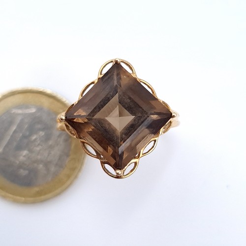 683 - Star Lot : A vintage very large, heavy  smoky quartz crown set stone ring, set in 9K gold, size P, w... 