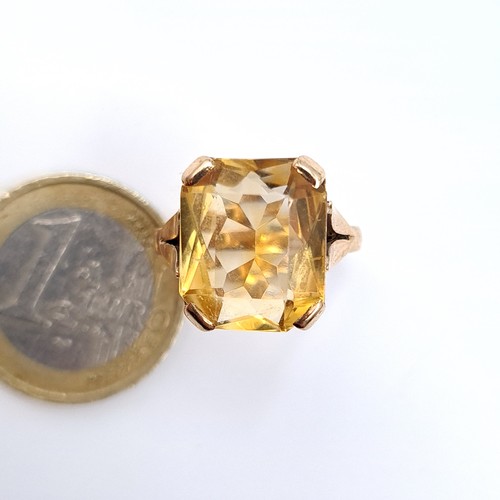 685 - Star Lot : An attractive heavy large citrine stone ring, size O, weight 4.50 grams, boxed.