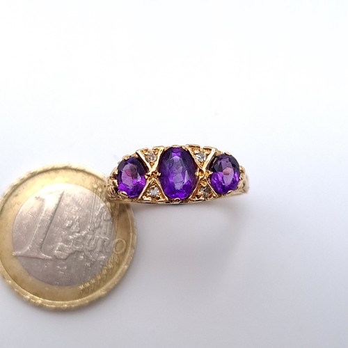 687 - Star Lot : A very pretty antique 9K gold ring, set with 3 amethyst stones with diamond accents, size... 