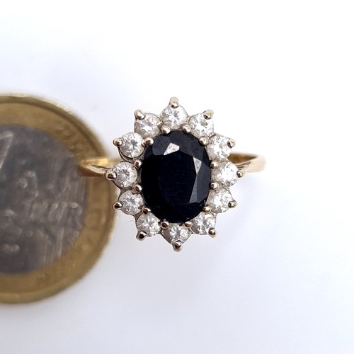 688 - Star Lot : A large sapphire stone ring with gem stone mount set in 9K gold, size M 1/2, weight 2.21 ... 