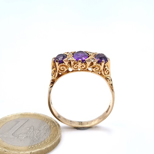 687 - Star Lot : A very pretty antique 9K gold ring, set with 3 amethyst stones with diamond accents, size... 