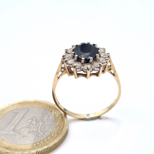 688 - Star Lot : A large sapphire stone ring with gem stone mount set in 9K gold, size M 1/2, weight 2.21 ... 