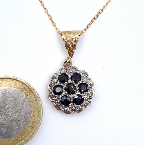 689 - Star Lot : A diamond and sapphire pendant set in 9K gold with chain, length 44cm, total weight 3.56 ... 