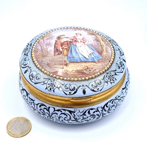 691 - Star Lot : A pretty vintage hinged dish set with a gilded rim ad seed pearl inlay surround, depictin... 