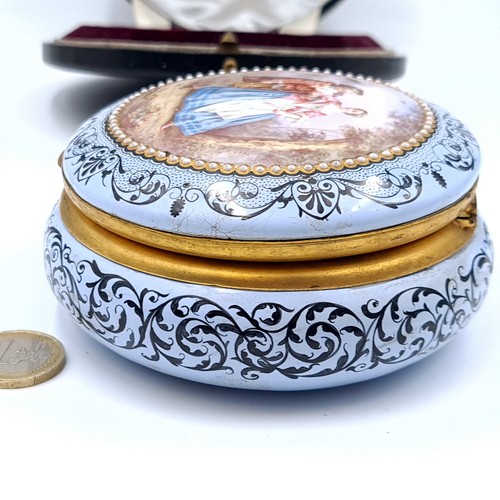 691 - Star Lot : A pretty vintage hinged dish set with a gilded rim ad seed pearl inlay surround, depictin... 