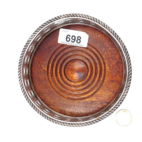 698 - A good quality large wine/champagne coaster with lattice design and ribbed finish with polished wood... 