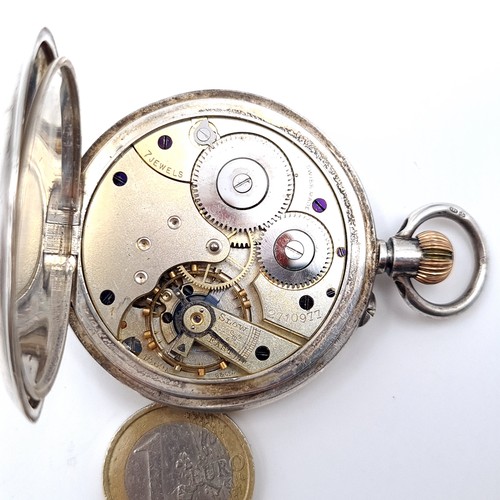 699 - A very handsome sterling silver cased pocket watch marked RS Rowell Oxford, watch has white enamel f... 