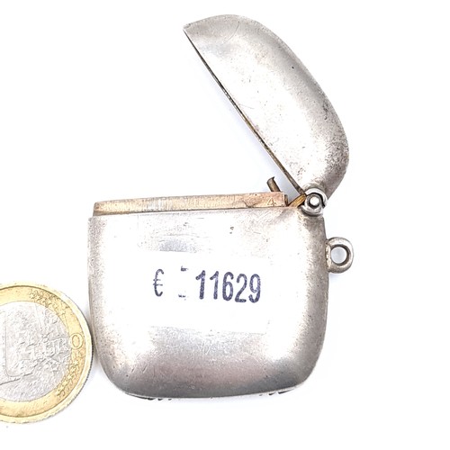 706 - A sterling silver vesta case, hallmarked. Case also features initialed front, 4cm square, weight 18.... 