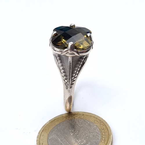 709 - A vintage silver claw set tourmaline stone ring, size P, weight 8 grams, boxed.