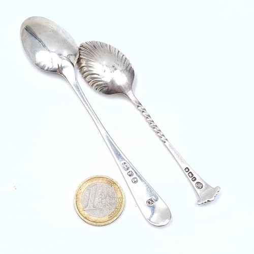 713 - Two sterling silver teaspoons, one with feathered bowl and barley twist handle, weight 11 grams, hal... 