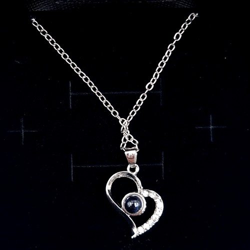 715 - A pretty necklace featuring a heart shaped pendant fitted with eye-catching stone. Held in a present... 