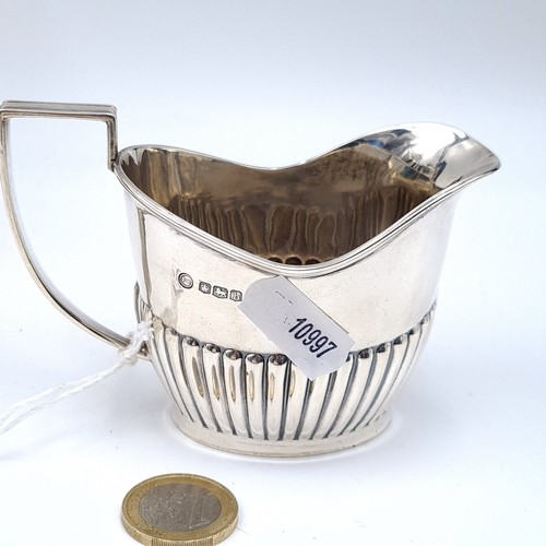 726 - Star Lot . Three piece sterling silver tea set consisting of tea pot with ebonized handle hallmarked... 