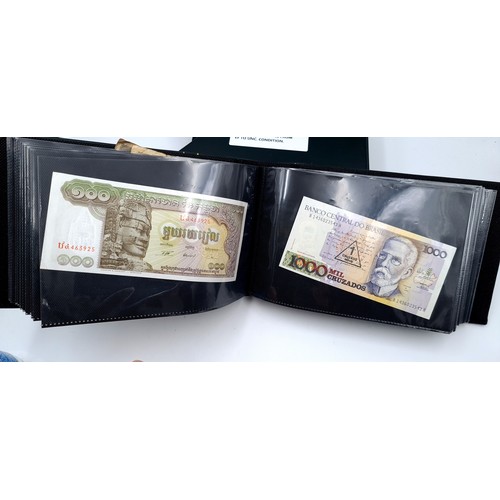 728 - A world banknote album of over 80 banknotes set in a leatherbound volume, notes from extra fine to u... 