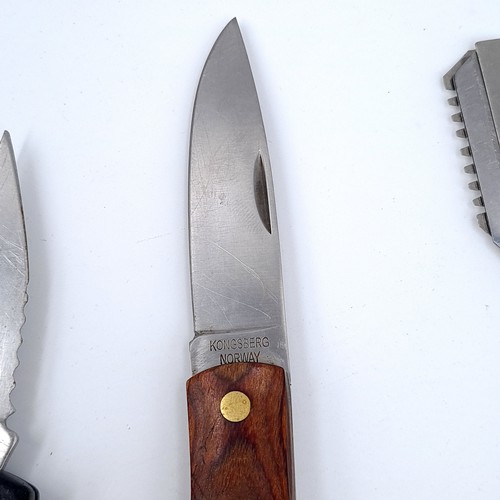 734 - A collection of five knives including a cut throat barbers example and a Ballistech hunting knife to... 