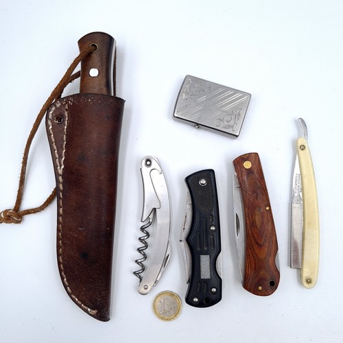 734 - A collection of five knives including a cut throat barbers example and a Ballistech hunting knife to... 