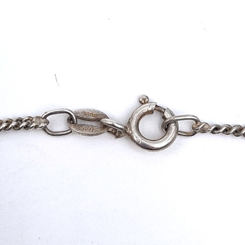 759 - A sterling silver pendant locket with chain. length of 40cm, total weight 12 grams.