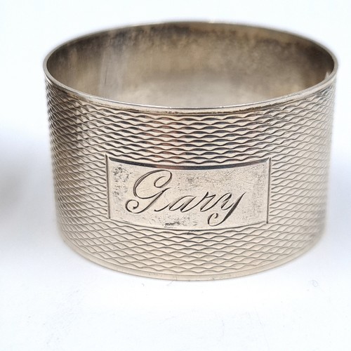 783 - Two sterling silver napkin rings, hallmarked Birmingham, weight 44 grams.