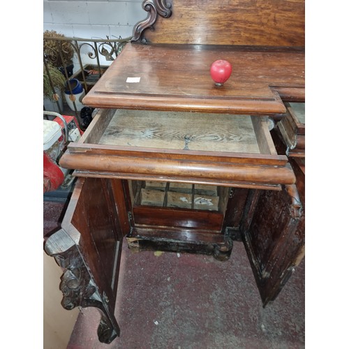 612 - Star Lot: A magnificent antique Victorian sideboard boasting fabulous carved scroll and leaf detail ... 