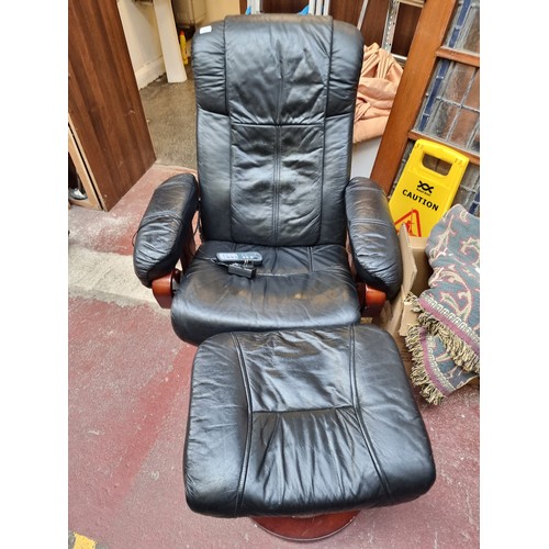 363 - Star Lot : A very stylish Kemi massage chair with matching foot stool with remote controlled vibrati... 