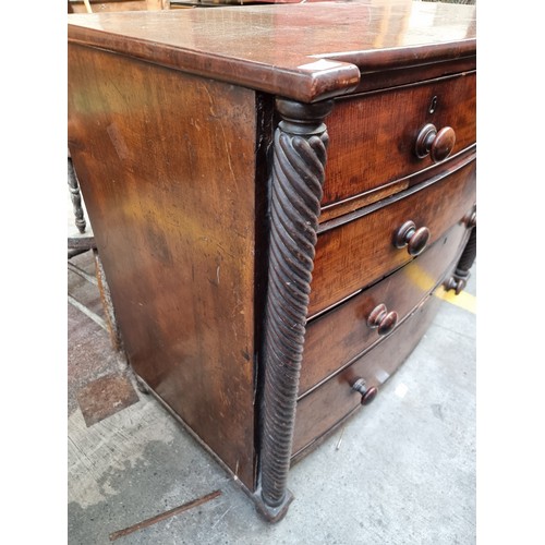 419 - Star Lot : A fabulous Irish bow-fronted chest of drawers with rope twist detailing to sides and five... 