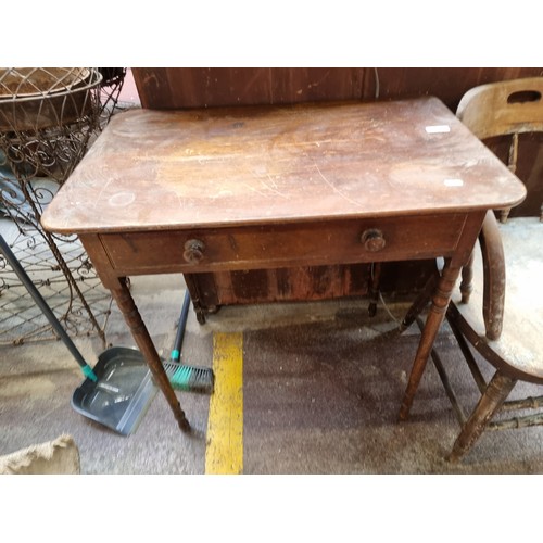 416 - A Victorian side table with a drawer to front and turned legs. From the pantry of the amazing, Monte... 