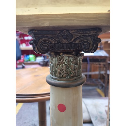 442 - Star Lot : A late 19th century antique onyx and brass column plant stand. Striking foliate detail to... 