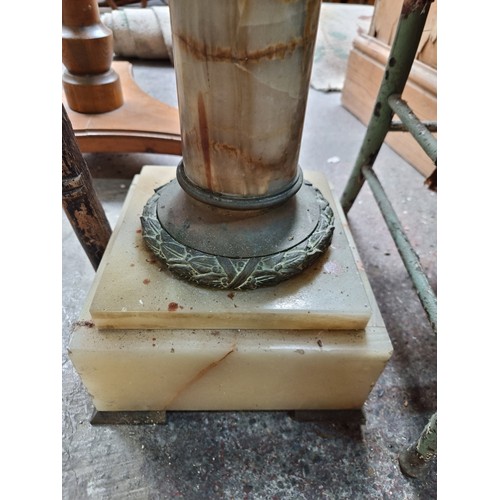 442 - Star Lot : A late 19th century antique onyx and brass column plant stand. Striking foliate detail to... 