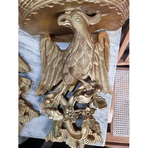 468 - Star Lot : A super pair of George II style molded antique gilt bracket sconces featuring eagle desig... 