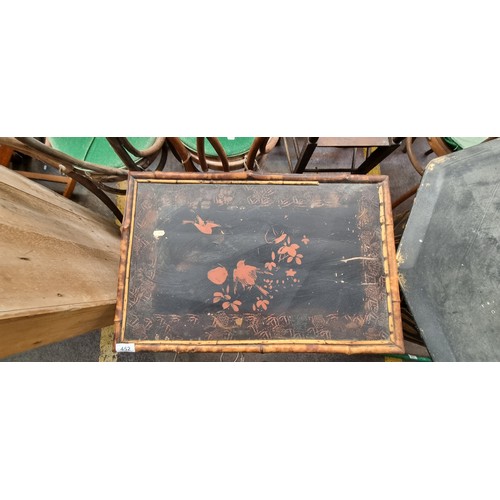 452 - A super late 19th century Chinoiserie bamboo side table. Features hand painted bird pattern to top. ... 