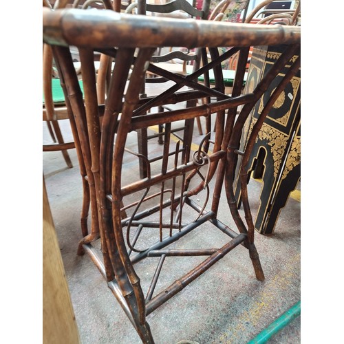 452 - A super late 19th century Chinoiserie bamboo side table. Features hand painted bird pattern to top. ... 