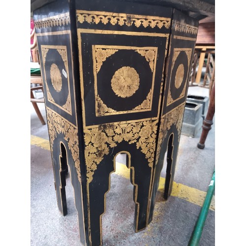 453 - Star Lot : A stunning late 19th Century Chinoiserie octagonal lacquered folding side table.  From th... 