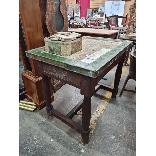 460 - A Victorian tile topped table with brass bound edge. Comes with original tiles to restore top. Prove... 