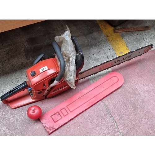 823 - A Pro Plus branded gasoline chainsaw type ZHZ034141 with a 480mm chain. Similar on line for €229 .