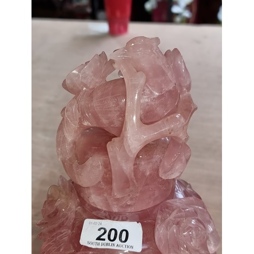 200 - A very heavy  gorgeous rose quartz urn vase featuring intricate hand carved floral and bird design i... 