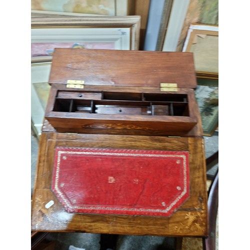 484 - Star Lot : A beautiful Victorian Davenport desk with a writing slope featuring a tooled red leather ... 