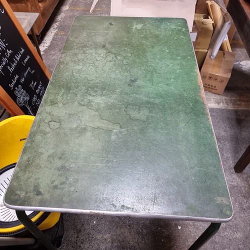 872 - A super retro green workbench supported by metal legs, with a petite filing cabinet fitted nicely un... 