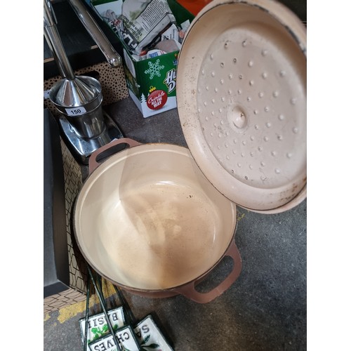 173 - A vintage very heavy French made cast iron Fontignac dutch oven with lid and handles.